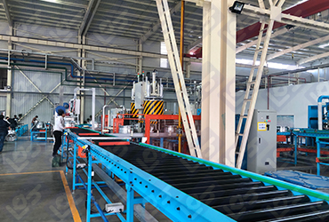 Conveyor line with light curtain recognition system is installed in front of the helium inspection machine